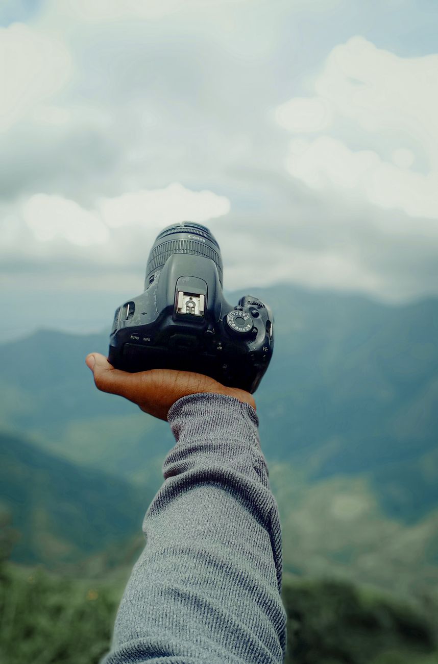 Travel photographer taking photos in nature